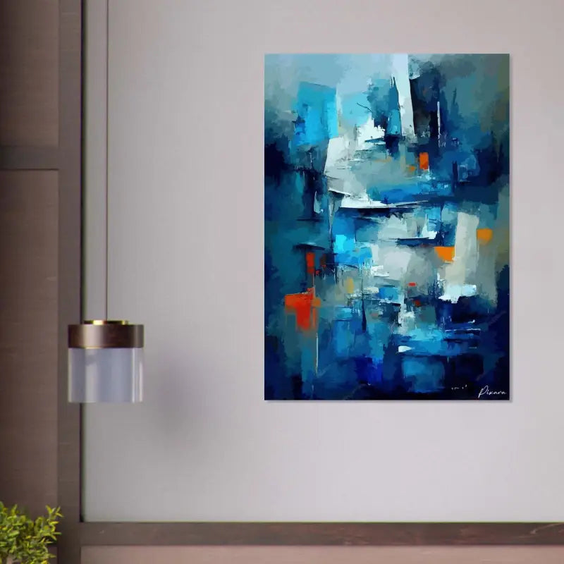 Peinture abstraite sur toile bleu et blanc avec des accents orange audacieux.