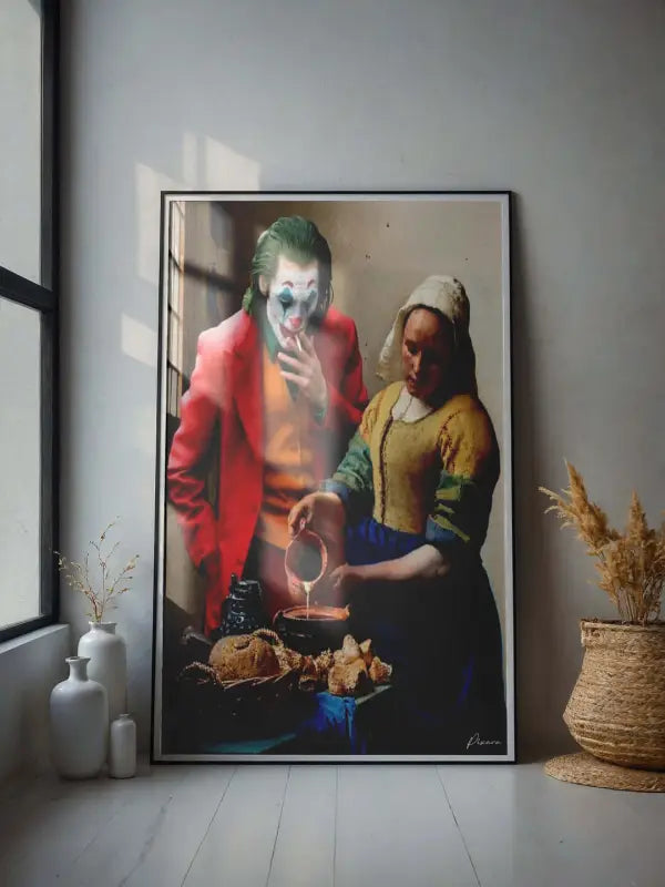 Une estampe artistique encadrée mettant en scène le joker dans un costume rouge versant un liquide dans un bol à côté d’une femme en tenue historique, rendue avec une clarté numérique moderne et signée par l’artiste.