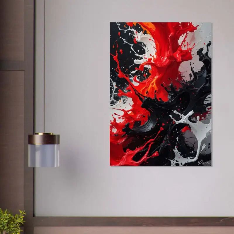 Peinture abstraite sur toile vibrante présentant des éclaboussures audacieuses de peinture rouge, noire et blanche.