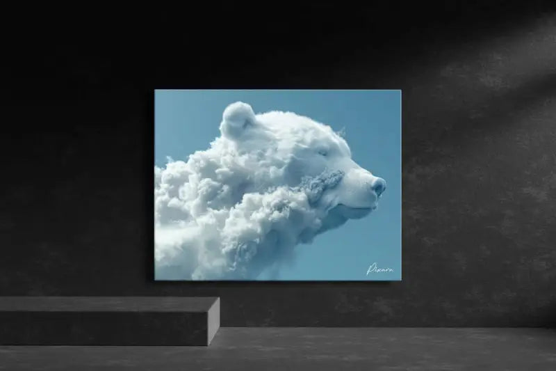 Un tirage sur toile rectangulaire mettant en scène un ours en forme de nuage blanc serein sur un ciel bleu doux.