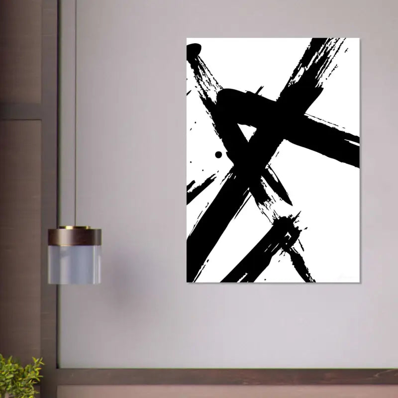 Art abstrait à l’encre noire sur toile avec un fond blanc.