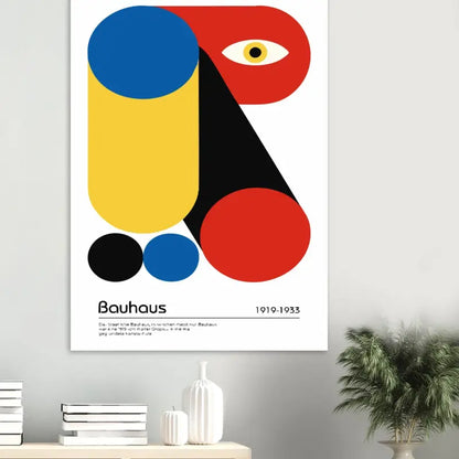Une affiche vibrante de style Bauhaus présentant des formes géométriques audacieuses en rouge, jaune, bleu et noir avec un design d’œil stylisé.