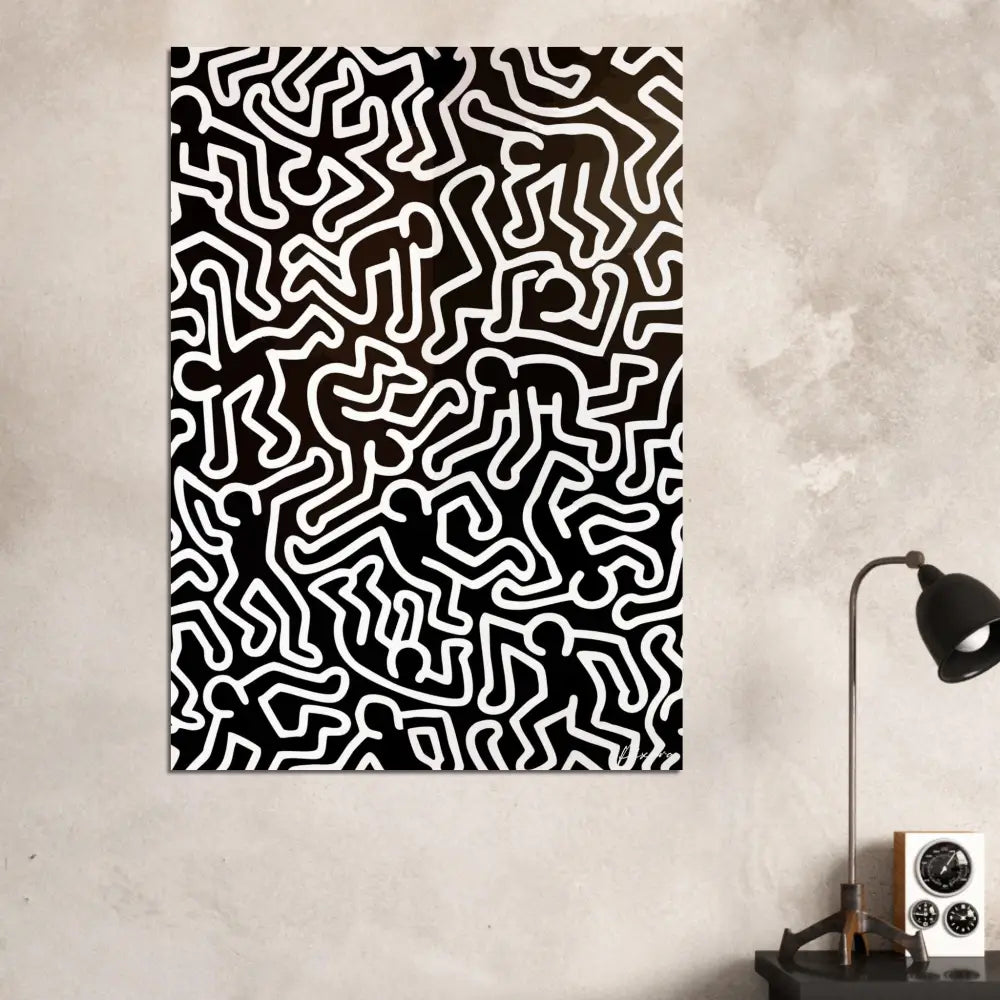 Toile abstraite noir et blanc mettant en vedette les figures stylisées emblématiques de Keith Haring en travail de ligne continue.