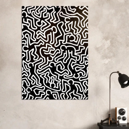 Toile abstraite noir et blanc mettant en vedette les figures stylisées emblématiques de Keith Haring en travail de ligne continue.