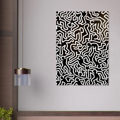 Toile abstraite en noir et blanc mettant en scène les figures stylisées emblématiques de Keith Haring en lignes continues fluides.