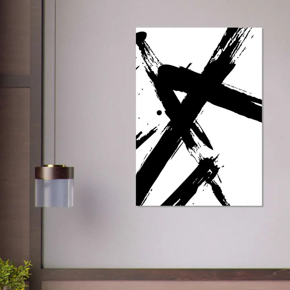 Art abstrait à l’encre noire sur toile avec un fond blanc.