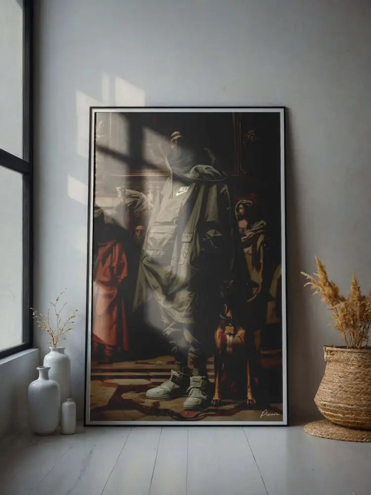 Une impression d’art encadrée représentant une scène dramatique de style clair-obscur avec des figures en tons sombres et des surlignages chauds.