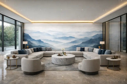 Canapé d’angle beige avec des coussins de jet bleu marine et une table basse en marbre au centre.