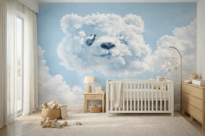 Lit en bois blanc avec des barreaux verticaux et une couverture drapée