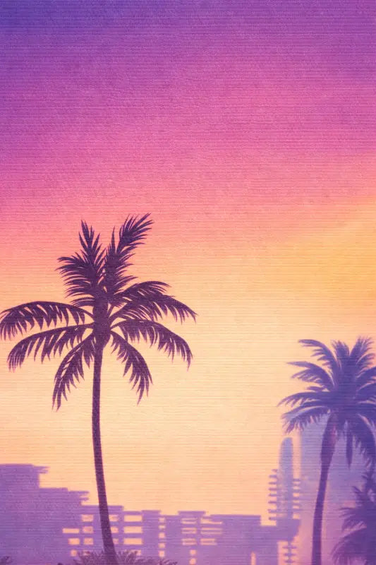 Silhouette d’un palmier contre un ciel dégradé vibrant passant du violet à l’orange.