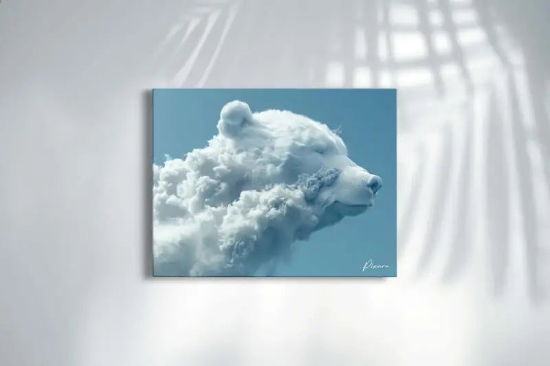 Un sérénissime impression sur toile représentant un ours blanc sculpté à partir de nuages moelleux sur un ciel bleu doux.